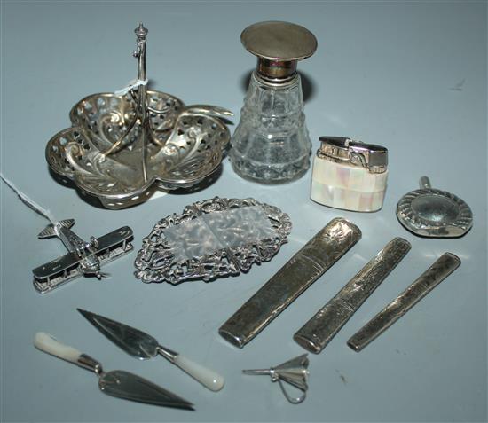 Various silver and other novelties, inc a Spad biplane, ring tree, scent bottle with funnel, pencil holders, buckle etc